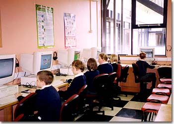 Pupils working at computers in our techroom